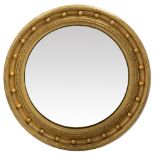 A GILT FRAMED CIRCULAR CONVEX WALL MIRROR 60cm diameter