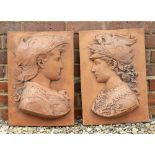 A PAIR OF CAST TERRACOTTA COLOURED RELIEF MOULDED PORTRAIT PLAQUES in the renaissance style 33cm