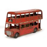 A MID 20TH CENTURY TIN PLATE RED PAINTED TRI-ANG LONDON TRANSPORT BUS 58cm long x 16cm wide x 30cm