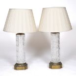 A PAIR OF CUT GLASS AND BRASS MOUNTED TABLE LAMPS of cylindrical form with hobnail cut decoration