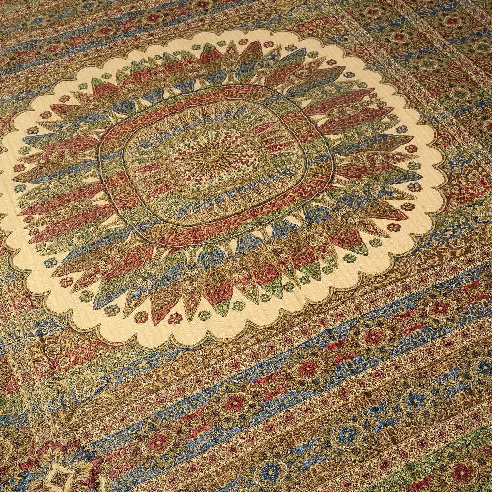 AN ORIENTAL POSSIBLY MIDDLE EASTERN SILK TABLE COVER OR BEDSPREAD with central radiating motif on