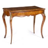 A VICTORIAN WALNUT SERPENTINE CARD TABLE with cross banded top, gilt metal mounts, the top opening