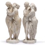 A PAIR OF CARVED ALABASTER SCULPTURES depicting classical lovers, each approximately 45.5cm high (