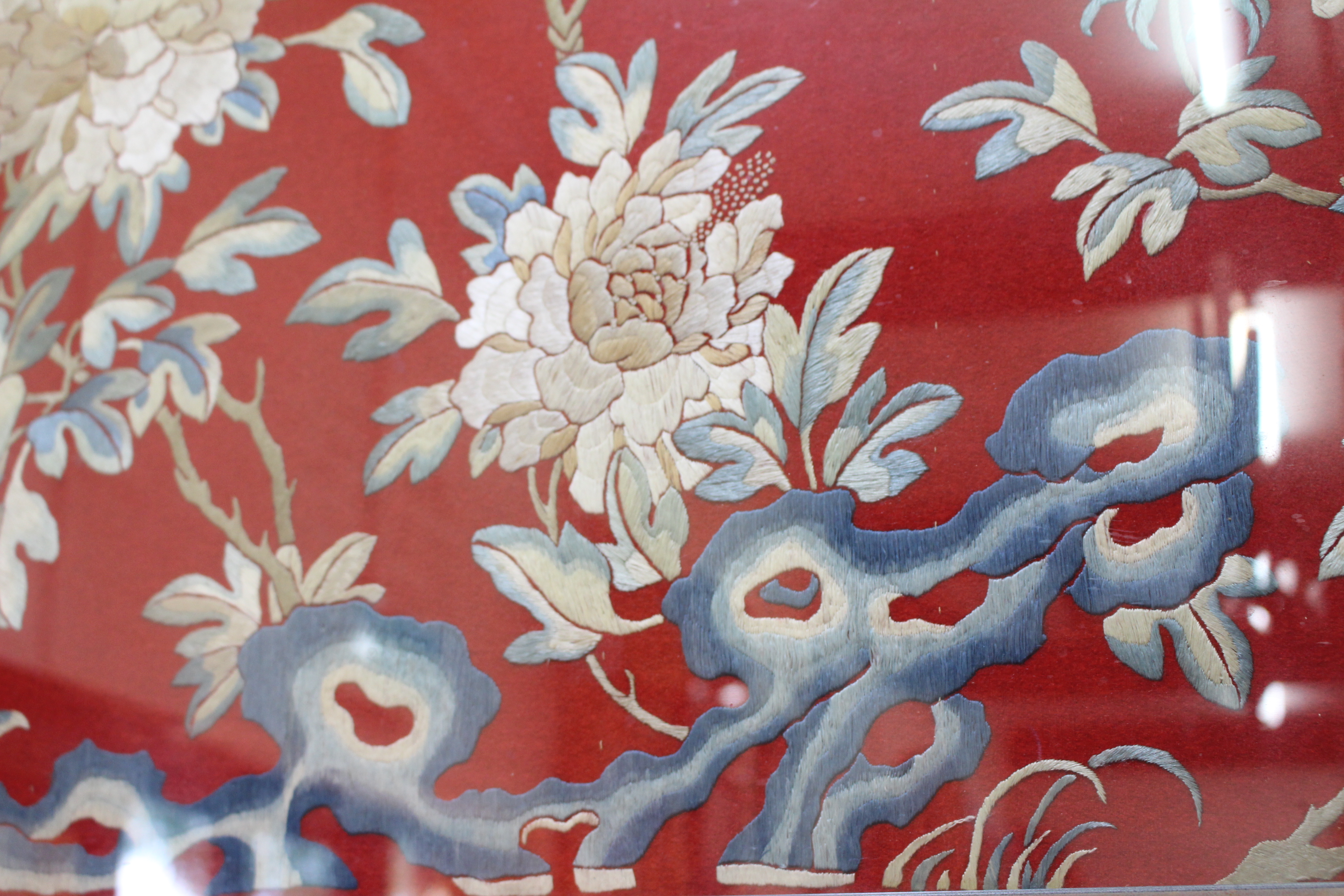 A CHINESE EMBROIDERED PANEL of phoenix amongst branches and flowers on a red felt ground, 56cm x - Image 6 of 10