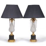 A PAIR OF DECORATIVE TABLE LAMPS with central baluster shaped hobnail cut glass sections flanked