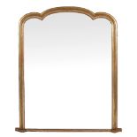 A VICTORIAN STYLE GILT OVERMANTLE MIRROR with arching top 132cm wide x 154cm high