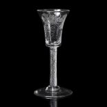 A MID 18TH CENTURY WINE GLASS with waisted conical bowl, engraved with fruiting vine and a bee, on