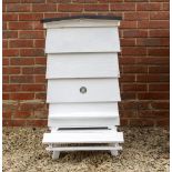 AN E.H. TAYLOR LIMITED WHITE PAINTED BEE HIVE 60cm wide x 101cm high