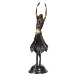 A BRONZE ART DECO STYLE DANCING LADY 63cm in height