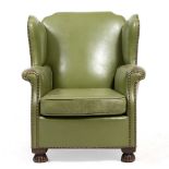 A GREEN STUDDED LEATHER UPHOLSTERED WING BACK CHAIR 74cm wide x 73cm deep x 80cm high