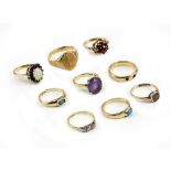 A GROUP OF NINE DECORATIVE RINGS (9)