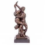 A BRONZE FIGURE OF HERCULES AND DIOMEDES on a black marble base, 11cm wide x 31cm high