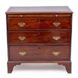 AN 18TH CENTURY STYLE MAHOGANY THREE DRAWER CHEST with a brushing slide, fitted with brass swan neck