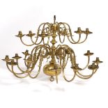 A LATE 19TH / EARLY 20TH CENTURY DUTCH STYLE BRASS EIGHTEEN BRANCH CHANDELIER 50cm overall