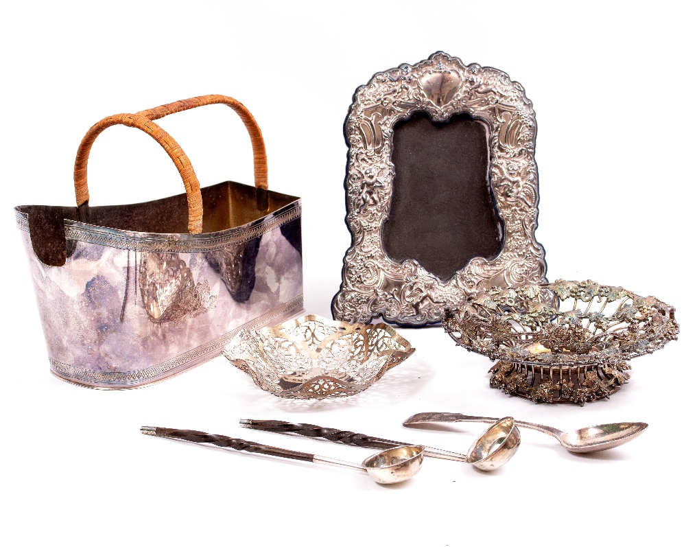 A SELECTION OF SILVER AND SILVER PLATE to include a pierced bonbon dish, a silver spoon, two white