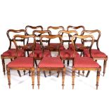 A SET OF EIGHT MID VICTORIAN ROSEWOOD BALLOON BACK DINING CHAIRS with carved horizontal splats,