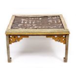 A 20TH CENTURY ORIENTAL STYLE LEATHER TOPPED COFFEE TABLE with a polychrome and gilt painted