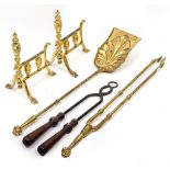 A PAIR OF POLISHED BRASS ANDIRONS and a selection of fire irons, tongs etc (6)