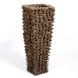 AN UNUSUAL STICK SCULPTURE PLANTER of square tapering form 30cm wide x 83cm high