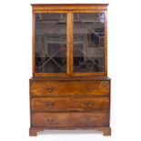 A LATE 18TH / EARLY 19TH CENTURY MAHOGANY SECRETAIRE BOOKCASE with a glazed panelled top, above a