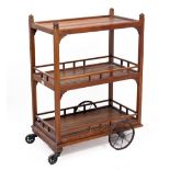 A TEAK THREE TIER TEA TROLLEY by Hughes, Bolckow & Co Limited, 74cm long x 43cm deep x 97cm high