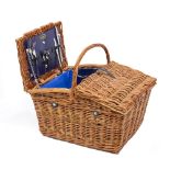 A WICKER PICNIC HAMPER for two, 'The Equestrian' by Strand, complete with cutlery and crockery, 55cm