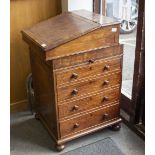 A WILLIAM IV MAHOGANY DAVENPORT in the manner of Gillows, with a brown leather inset lifting and