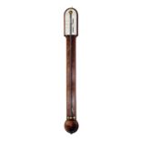 A MAHOGANY STICK BAROMETER the arched silvered Vernier scale signed 'Watkins & Hill, 5 Charing