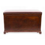 A HARDWOOD LEATHERETTE UPHOLSTERED STOOL / RISING TELEVISION CABINET in the Georgian style on