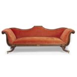 A REGENCY MAHOGANY FRAMED SOFA with shaped back, scroll ends and sabre legs terminating in hairy paw