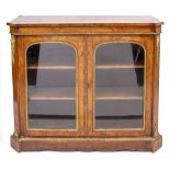 A VICTORIAN BURR WALNUT CABINET with a three tier mirrored back, twin glazed doors, gilt mounts