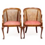 A PAIR OF EDWARDIAN MAHOGANY CANE UPHOLSTERED TUB CHAIRS with chinoiserie painted decoration and