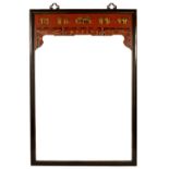 A LARGE ORIENTAL BLACK AND OXBLOOD RED LACQUERED WALL MIRROR with panels above the mirror plate