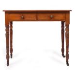 A VICTORIAN MAHOGANY SIDE TABLE with two frieze drawers with turned handles, standing on ring turned