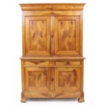 A 19TH CENTURY CONTINENTAL FRUITWOOD CABINET with twin panel doors opening to reveal shelves above