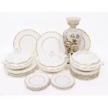 A ROYAL DOULTON PART DINNER SERVICE 'RICHELIEU' with white and gilt pattern to include tureens,