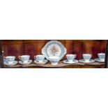 A ROYAL ALBERT 'ENCHANTMENT' PART TEA SET to include plates, cups, side plates etc (a quantity)