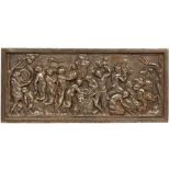 A CAST IRON RELIEF PANEL depicting Bacchanalian scene with integral moulded frame, 53.5cm wide x