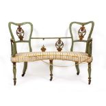 A VICTORIAN TWO SEATER SALON SHAPED SETTEE with overpainted green decoration and floral shaped