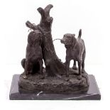 A BRONZE FIGURAL GROUP of two hunting dogs tethered to a tree stump, mounted on a black marble base,