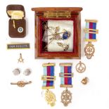 A GROUP OF MASONIC MEDALS one being 9 carat yellow gold, a silver gilt example and one other; a 9