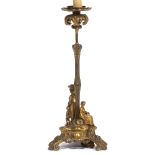 A VICTORIAN GILT CAST METAL TABLE LAMP converted for electric use, the base decorated with grape