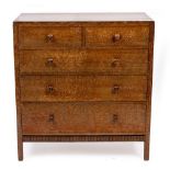 A 20TH CENTURY WARING & GILLOW LIGHT OAK CHEST OF DRAWERS fitted with two short and three long