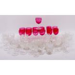 A COLLECTION OF RING TURNED CRANBERRY WINE GLASSES together with further glassware to include wine