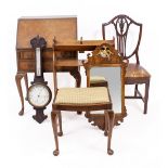 A WALNUT BUREAU 65cm wide together with an oak bookstand, fret framed wall mirror, barometer, a