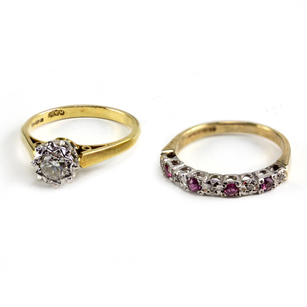 A DIAMOND SOLITAIRE ON 18 CARAT YELLOW GOLD BAND size Q, and a nine stone half hoop ring size P/O,
