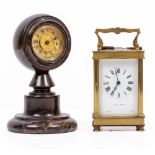 A BRITISH UNITED CLOCK CO LIMITED CORNISH SERPENTINE MANTLE TIMEPIECE 18cm in height, and a brass