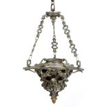 A CAST SPELTER CEILING LAMP decorated with putti and scrolls and suspended from three chains and a