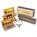 A BOX OF APPROXIMATELY FIFTY ANTIQUE MICROSCOPE SLIDES, three cased scales and two old glass and