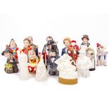 A COLLECTION OF PORCELAIN CANDLE SNUFFERS to include Royal Worcester and modern examples, some